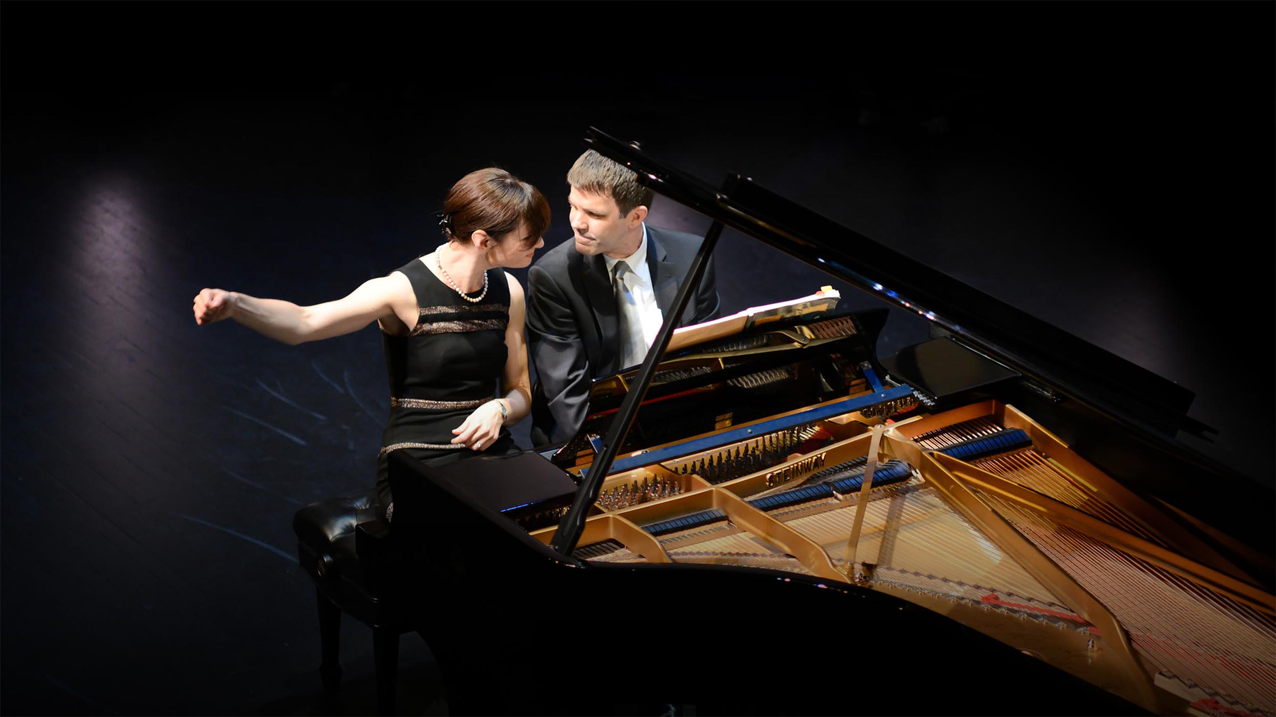Lomazov Rackers piano duo playing piano